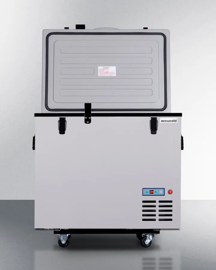 Summit SPRF86M2 Portable 12V/24V Cooler Capable Of Operation As Refrigerator (2-8(Degree)C) Or Freezer (-12(Degree)C). With Insulated Cover. Interior Wire Basket. Factory-Installed Lock. Strap Handle. And Four Pre-Installed Wheels
